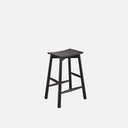 Olly stool in black ash with contoured seat and solid ash legs