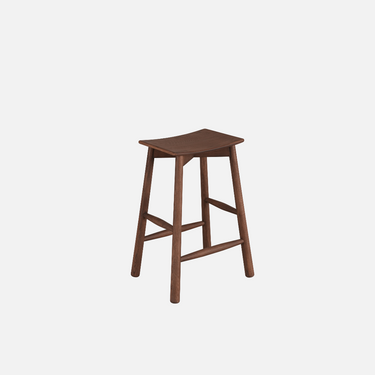 Olly stool in brown ash with contoured seat and solid ash legs