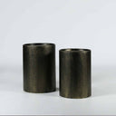 Drum side tables in antique gold iron, set of two