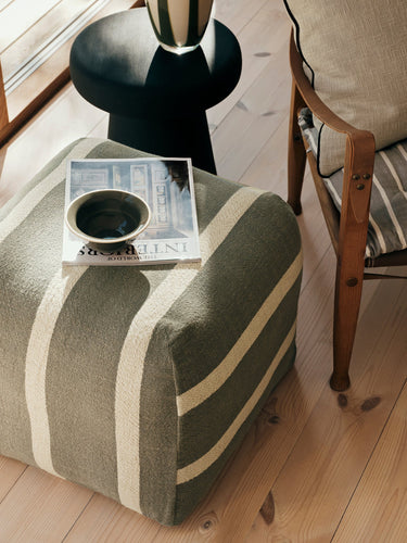 Broste Sigrid Pouf agave green styled in a living room