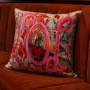 Abstract Pop velvet cushion styled on a sofa
