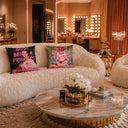 Dark red Being A Princess velvet cushion styled on a sofa