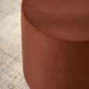 Mee Swivel Ottoman in a living room