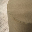 Mee Swivel Ottoman in a living room