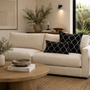 Black linen lumbar cushion embroidery detail