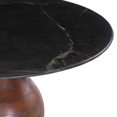 Orb Marble Dining Table, showing the orb-shaped mango wood pedestal base