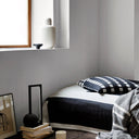 Kristina Dam Geometric Table Lamp lit, showing the warm 2700K LED