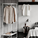 Kristina Dam Cone Table Lamp lit on a side table