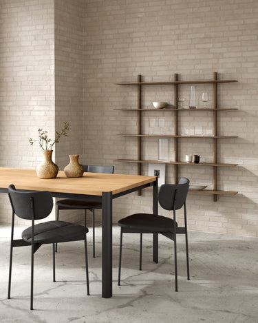 MUUBS Oni dining chair side view showing organic backrest