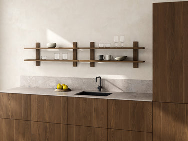 MUUBS Tay shelf styled with decor on a wall