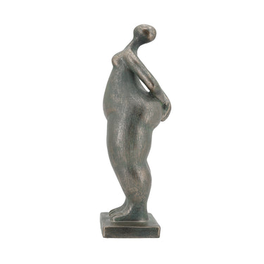 Detail of the abstracted head and shoulders on the lady figurine