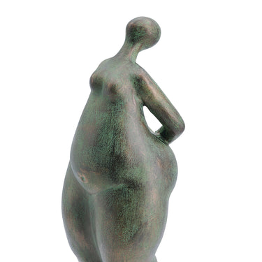 Side profile of the standing lady sculpture in aged bronze finish