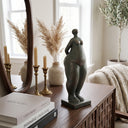 Integrated square plinth base of the lady figurine