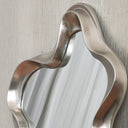 Silver sculptural frame detail