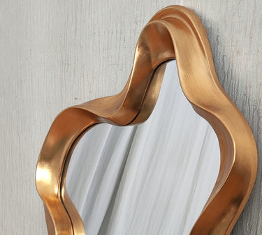 Gold sculptural frame detail