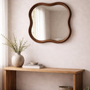 Walnut square squiggle mirror styled in a room
