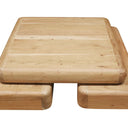 Angled view of the Bambam square acacia coffee table in a natural finish