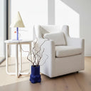 Baxter Oscar Swivel Boucle Armchair at Online8 Furniture Auckland NZ