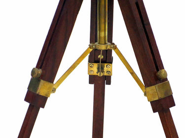 Brass spyglass telescope with a rotating threaded section near the eyepiece for focus