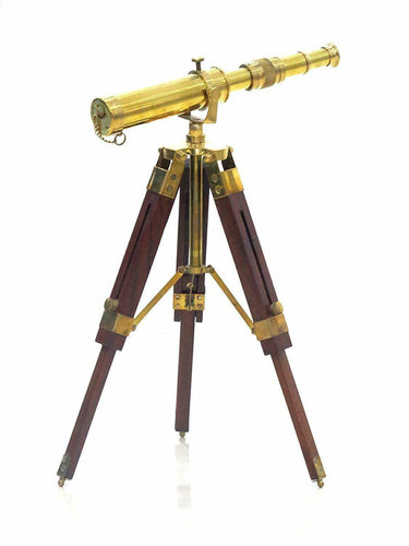 Handcrafted wooden tripod stand supporting the golden brass nautical spyglass telescope