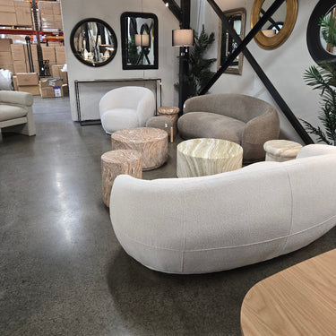 Caprice Curved 2.5 Seater Sofa with a sleek low-profile silhouette that opens up a room
