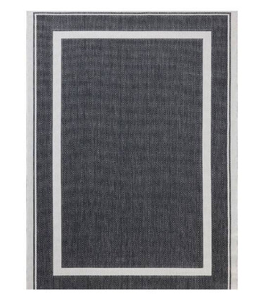 Onyx/Ivory Easton reversible rug in durable polypropylene and polyester, easy to hose clean
