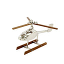 Helicopter Ornament in polished nickel and wood, a decorative aluminium helicopter model 32.3cm long