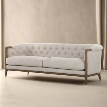 Cream Regal suite in stain-resistant performance fabric with classic button tufting
