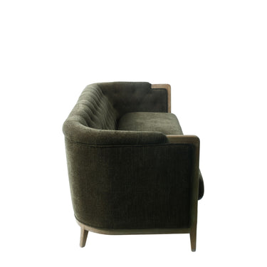 Olive Regal suite in a deep, earthy tone as a grounding focal point