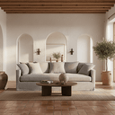 Illustrated NZ living room featuring a curved linen sofa, light oak coffee table, and muted sage green accents with warm neutral tones