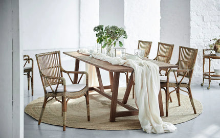 Sika Design handcrafted rattan armchair in a luxury interior — available at Online8 Auckland