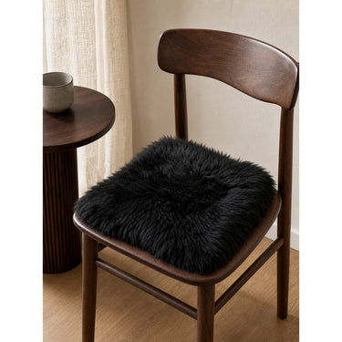 Kaikoura Long Wool Square Seat Pad - Black at Online8 Furniture Auckland NZ