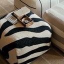 Broste Zebra Pouf black and beige styled in a living room