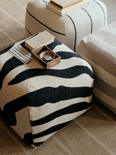 Broste Zebra Pouf black and beige styled in a living room