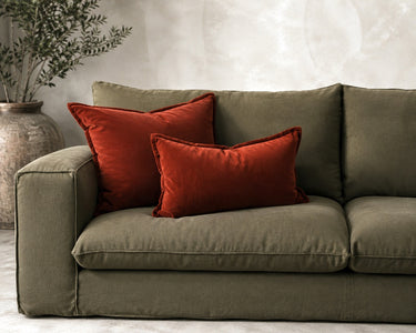 Burnt terracotta velvet lumbar cushion detail