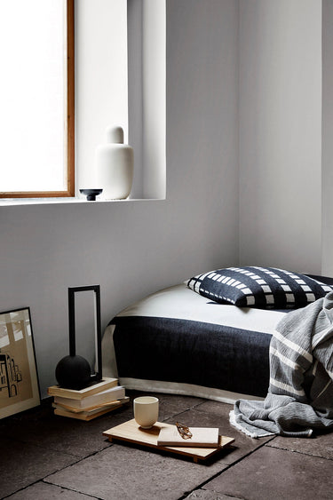 Kristina Dam Geometric Table Lamp lit, showing the warm 2700K LED