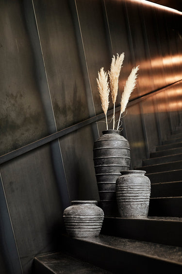 MUUBS Melancholia 40 pot styled with a plant