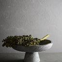 MUUBS Luna bowl side view showing heavy base and wave-like rim