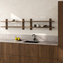 MUUBS Tay shelf styled with decor on a wall
