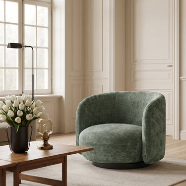 Harlow Swivel Chair in moss in an interior setting