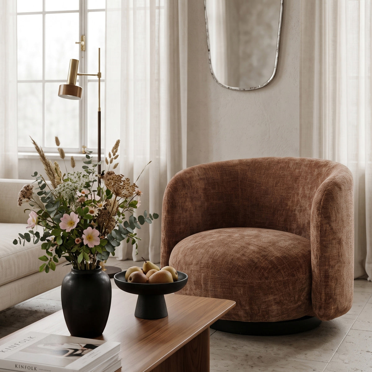 Harlow Swivel Chair in tobacco fabric styled in a luxurious living room
