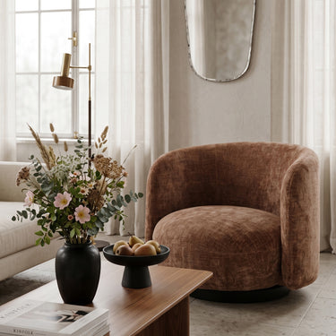 Harlow Swivel Chair in tobacco in an interior setting