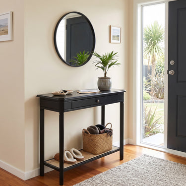 Moderno Console 80cm in black and rattan, styled in a room