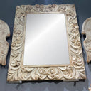 Antique marble ornate mirror frame detail