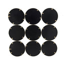 Gold ring grid mirror styled on a wall