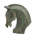 Close up of the laid back ears and speckled verdigris patina