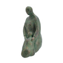 Detail of the verdigris patina on the mother and child sculpture