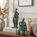 Stone powder and resin surface texture on the mother and child figurine