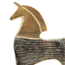 Horse sculpture styled on a console with its white marble base