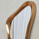 Sculptural gold frame detail